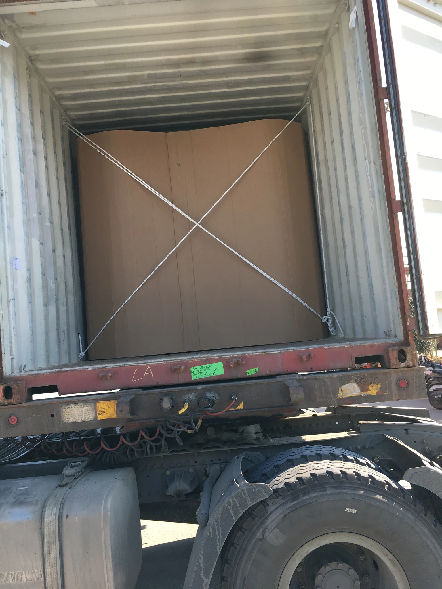Closed shipping container secured for export
